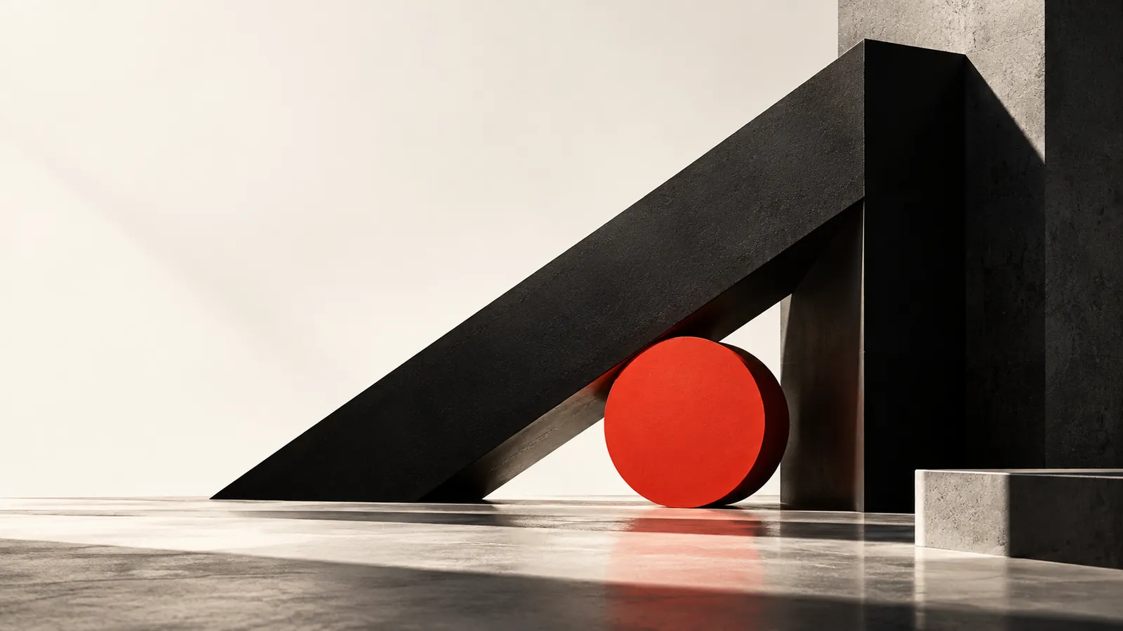 Black angular sculpture and a red disc casting hard shadows